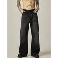 Black loose straight leg jeans with retro styling and zipper fly closure