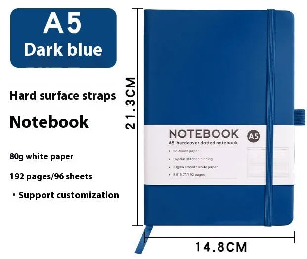 A5 size notebook with soft skin-feel PU leather cover and strap closure, open to show horizontal lined pages.