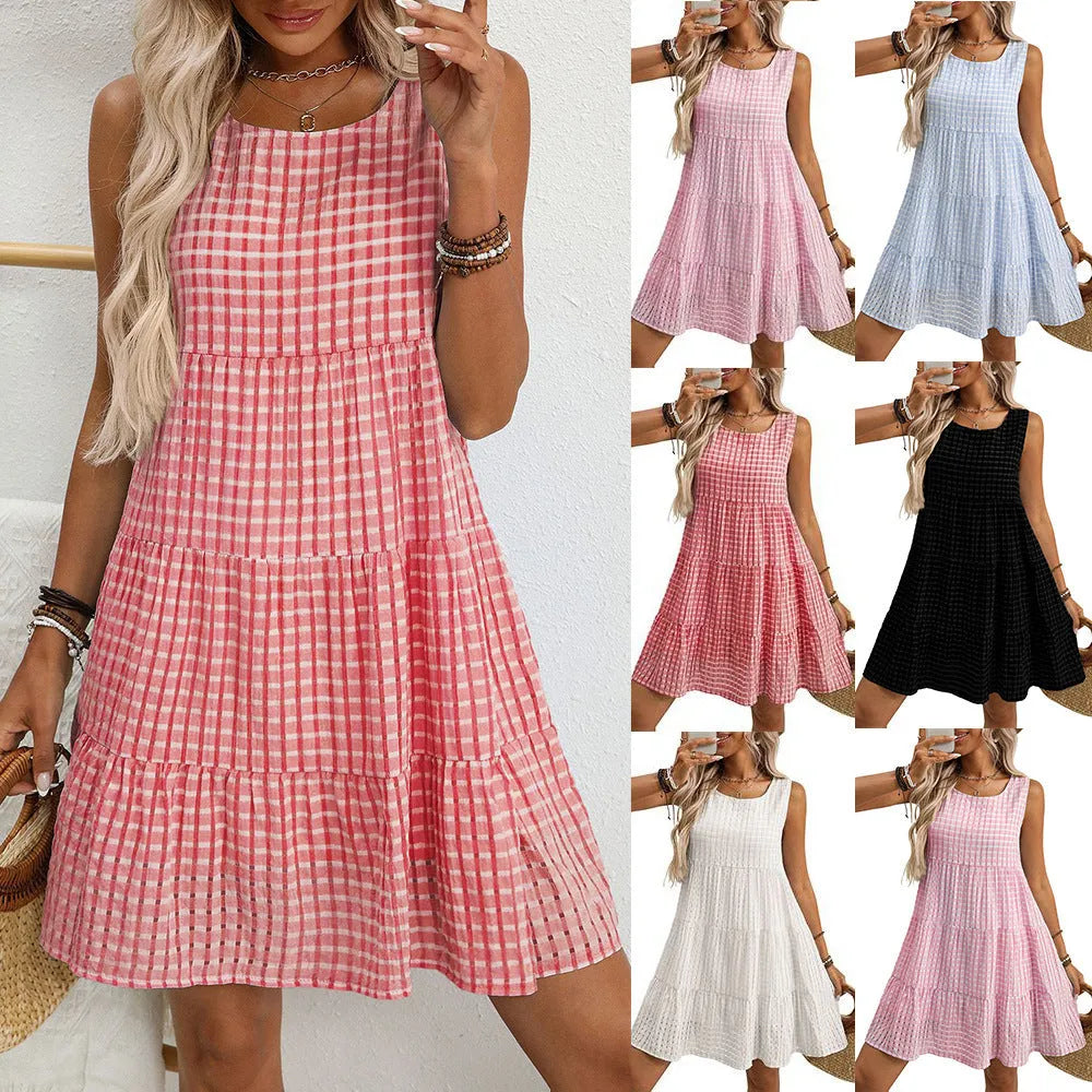 Women's sleeveless plaid dress with high waist and an oversized swing skirt in a light blue colour.