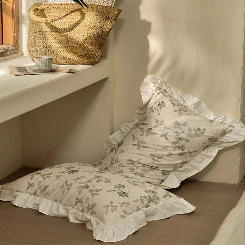 Cotton linen yarn-dyed printed four-piece bedding set in Raw Jute Colour with plants and flowers pattern on a bed