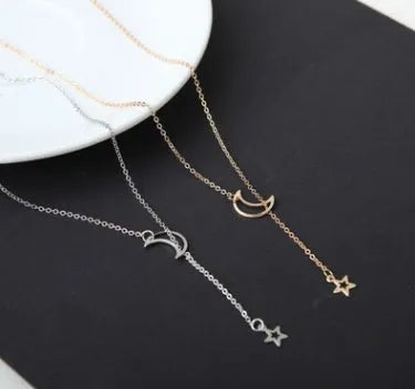 Simple moon star clavicle necklace in alloy with diamond treatment, shown in golden and silver colour options.
