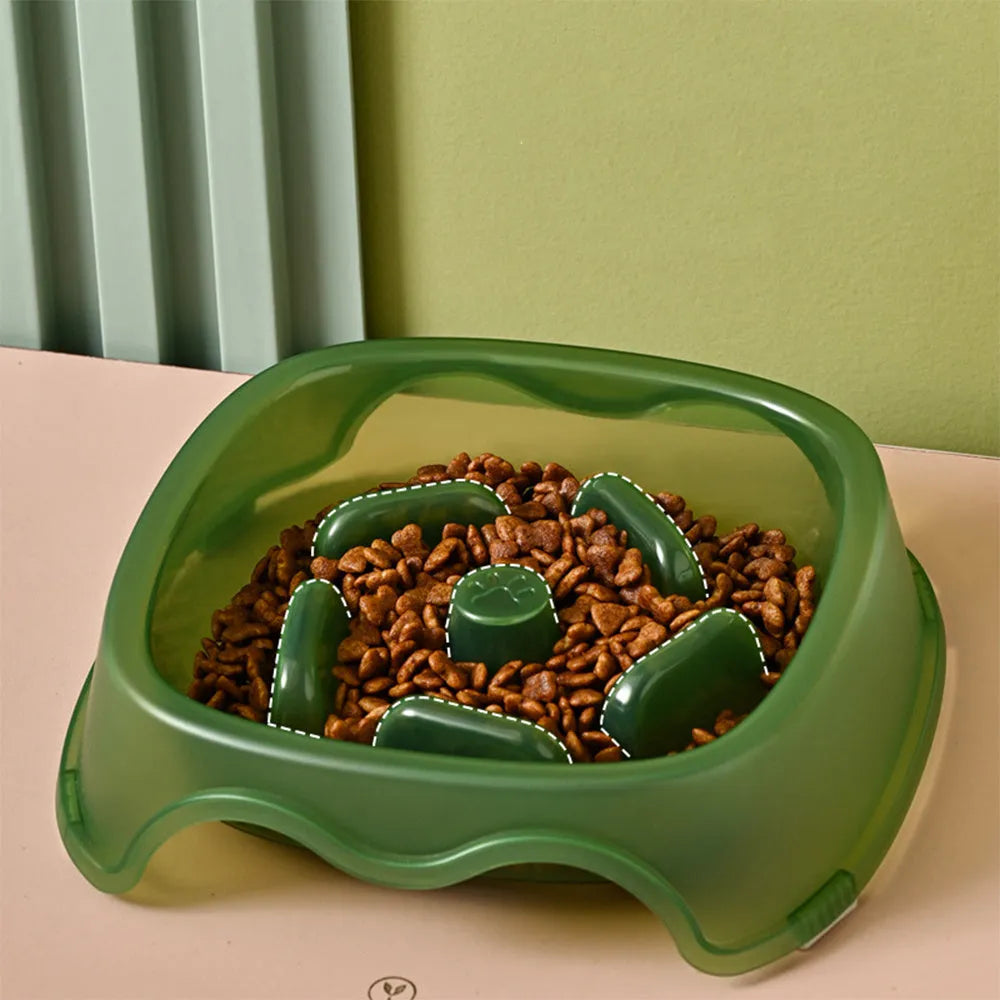 Blue plastic slow feeder dog bowl with internal ridges to prevent choking.