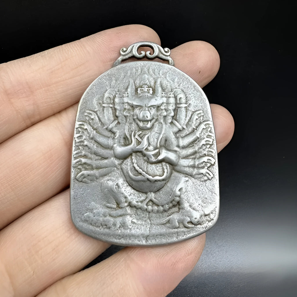 Antique Chinese style geometric iron pendant with Yamantaka Aryaacalanatha design.