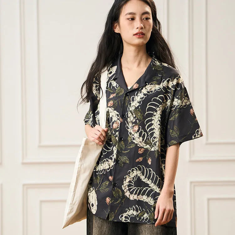 Men's short sleeve Cuban collar shirt with a snake bone floral pattern print in assorted colours.