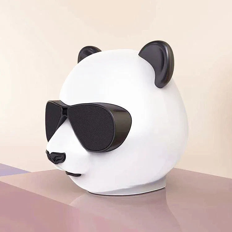 Compact classic style portable mini Bluetooth speaker on a surface.