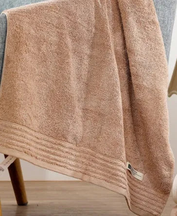 Six-piece cotton towel set showing bath, hand, and washcloth sizes in beige colour.