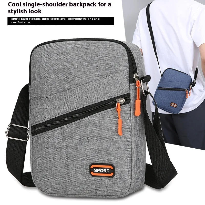 Oxford cloth crossbody commuter bag with contrast colour detailing in silver grey colour option