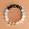 Natural crystal bracelet with Chinese five elements complementary design in Earth Gold colour, 8mm beads on white background