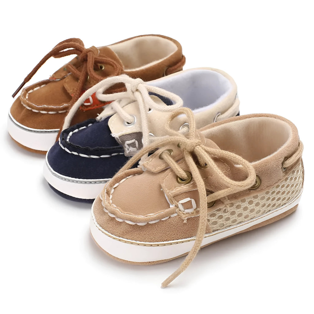 Baby soft bottom toddler shoes in beige with mesh upper and non-slip sole on a white background