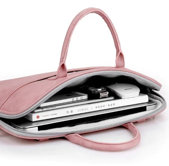 Faux leather medium shoulder laptop bag in black with zipper, plain finish, multiple interior pockets