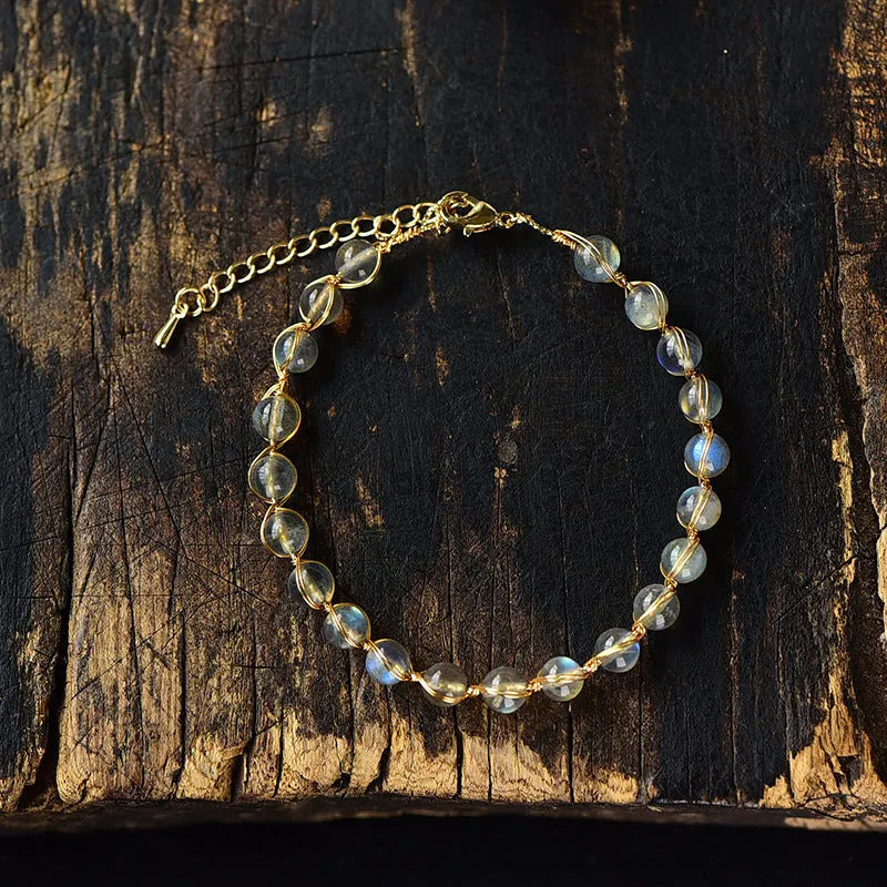 Blue moonstone bracelet with 14K gilded metal celestial design
