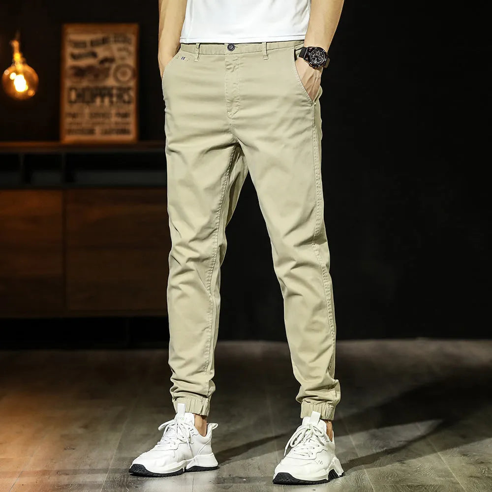 Men's khaki cotton tapered casual pants with ankle ties, mid waist and zipper fly, size 32