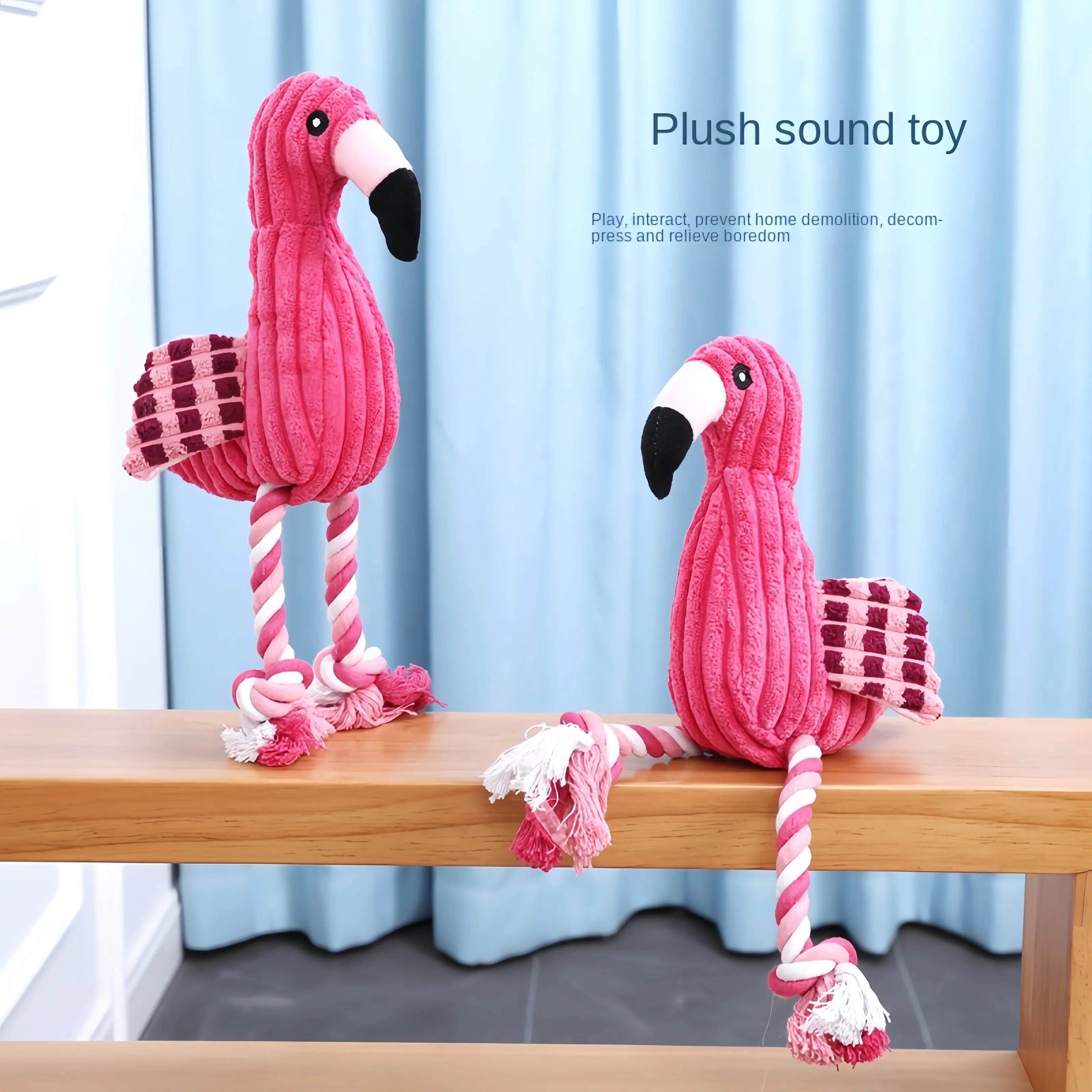 Pink animal-shaped corduroy plush dog toy with a squeaker inside.