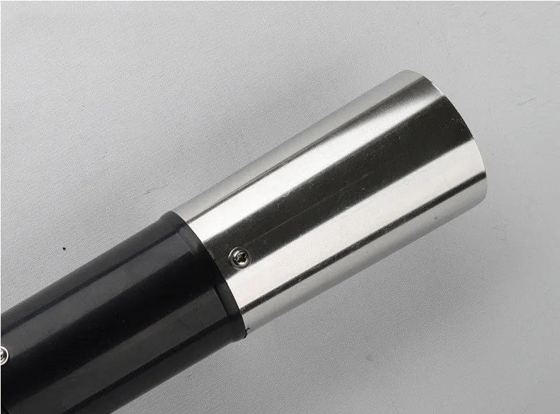 Black electric fish scale scraper with plastic shell and alloy parts, 7000 r/min descaling tool on a table
