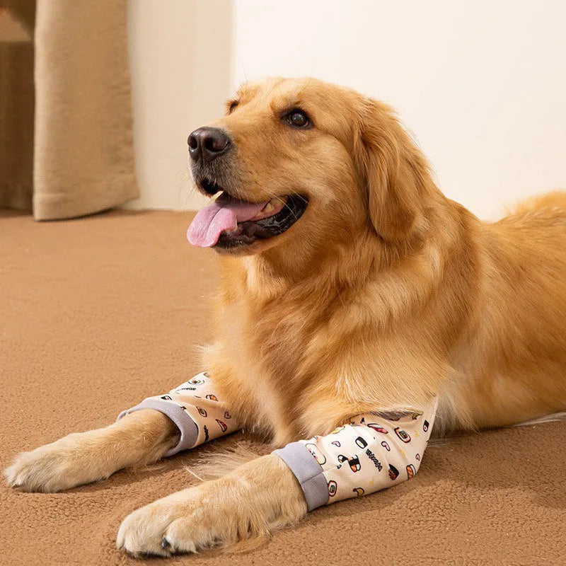 Blue adjustable dog knee protector sleeve with padded elbow patch and matching scarf laid flat.