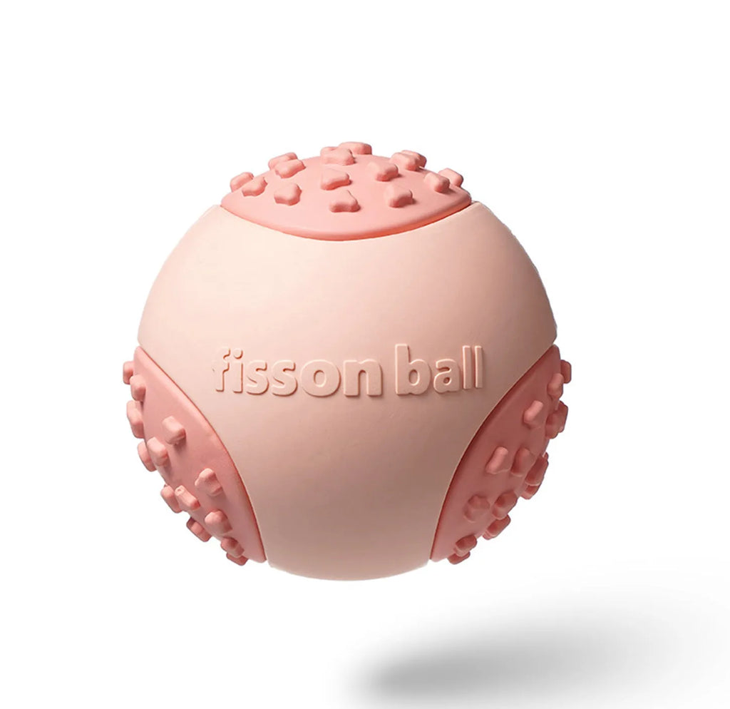 Green and pink rolling ball dog toys showing 64mm diameter measurement