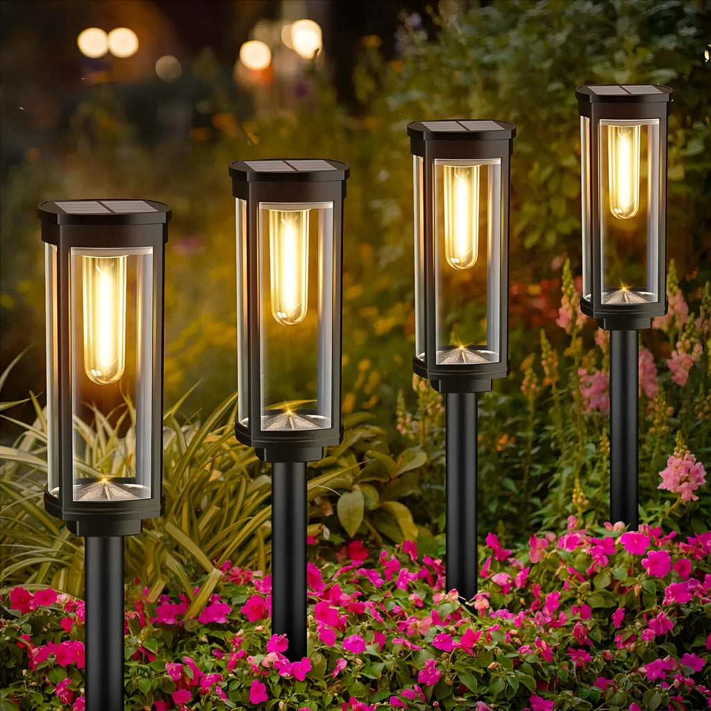 Solar tungsten wire lawn lamp in an outdoor courtyard, providing ground-level lighting