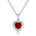 Women's sterling silver necklace with heart-shaped gemstone pendant on adjustable cross chain