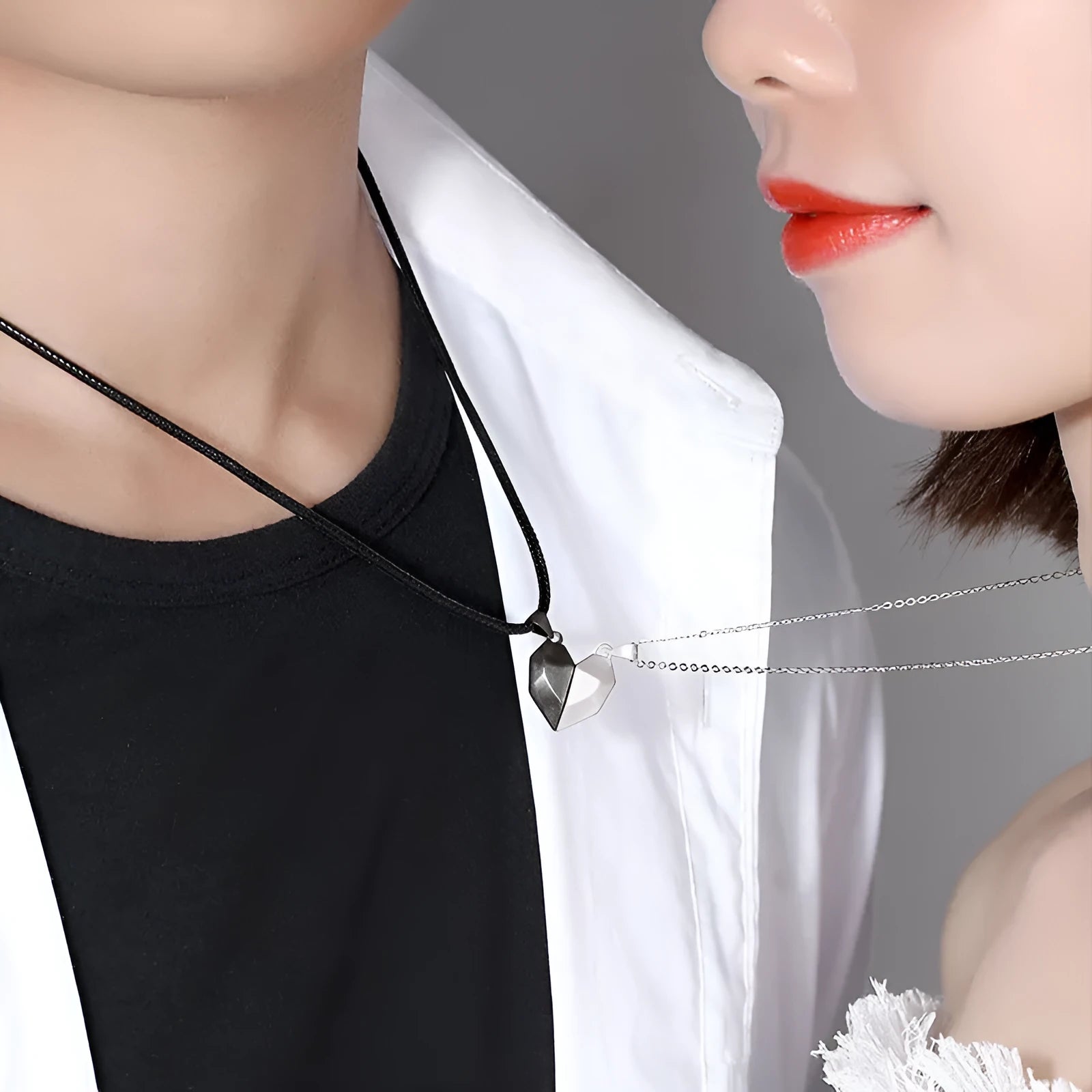 Minimalist magnetic heart pendant couple necklace with gold-plated finish, black and white colours, on adjustable 62cm chain
