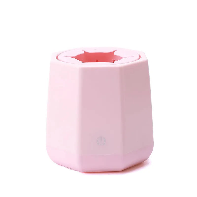 White baby electric milk shaker with silicone slot holding a baby bottle on a table, 110x110x110mm size