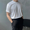 Men's slim fit cotton t-shirt in solid white and black colours with round neck and short sleeves