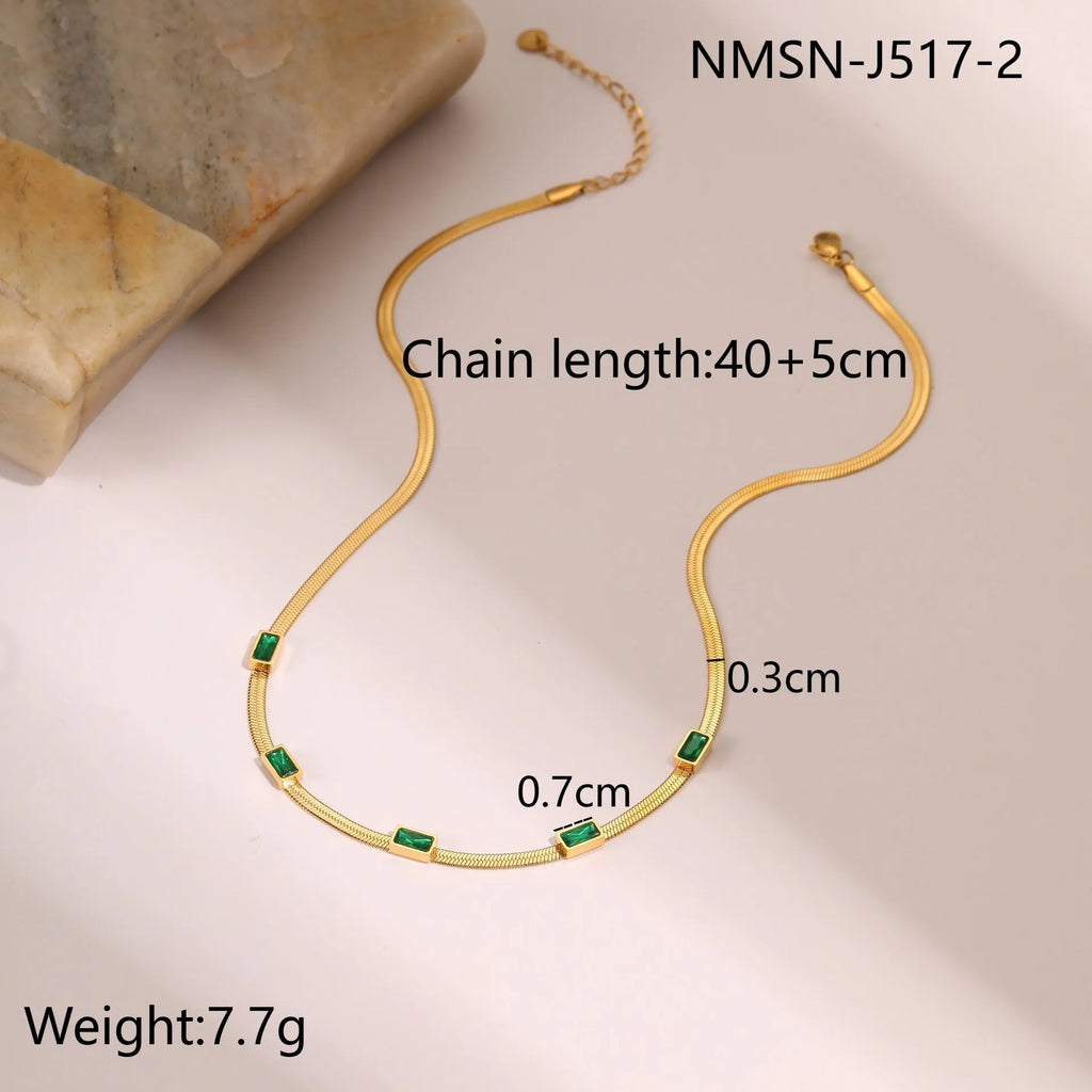Gold retro geometric square zircon stainless steel necklace on a flat snake chain.