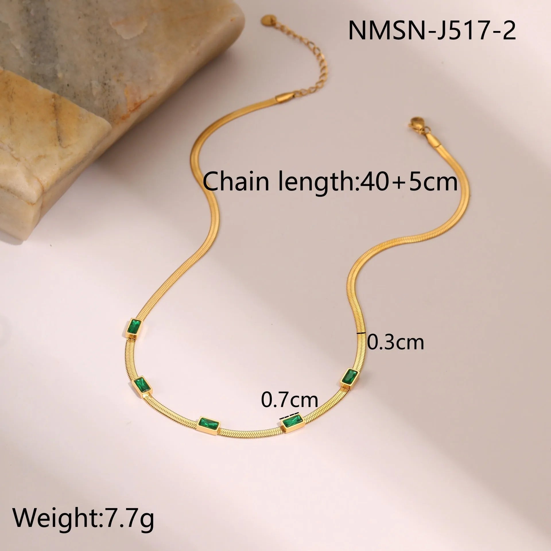 Gold retro geometric square zircon stainless steel necklace on a flat snake chain.