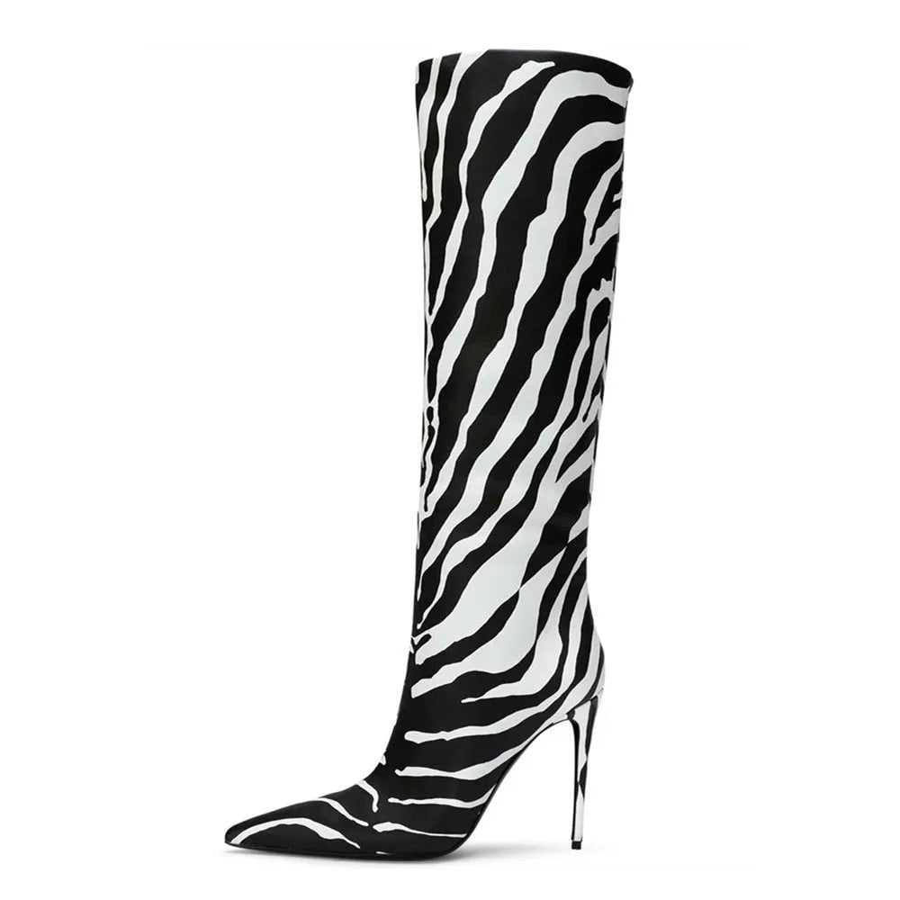 Women's leopard print pointed stiletto heel boots with side zipper on display