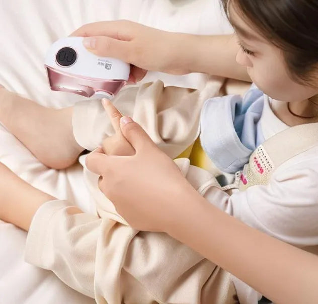 Blue automatic electric nail clipper and polisher with USB Type-C charging cable and cleaning brush.