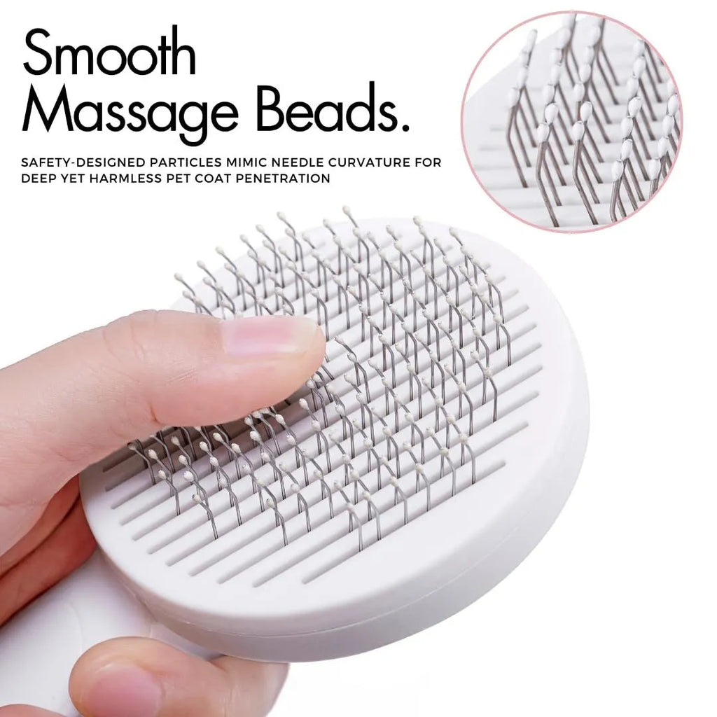Blue grey pink self-cleaning pet grooming brush with ergonomic rubber handle.