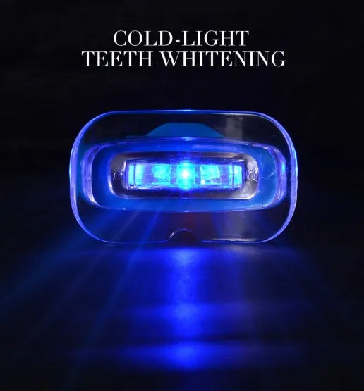 Teeth whitening kit with LED light and three 3ml gel sticks in blue packaging