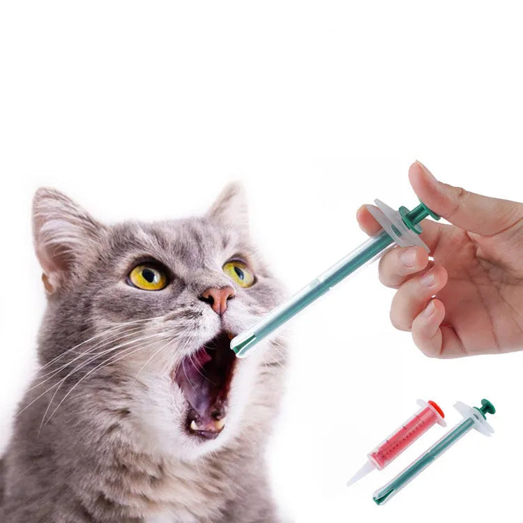 Two pet pill shooter tools with soft silicone tips for medicine feeding to cats and dogs