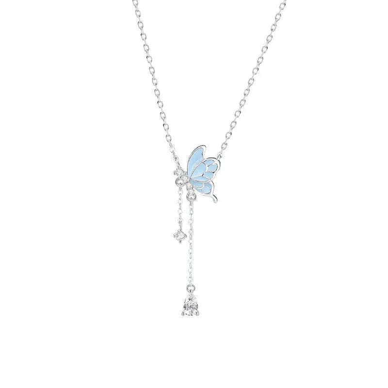 925 sterling silver butterfly tassel noctilucent necklace with O-ring chain on model, luminous pendant visible in low light