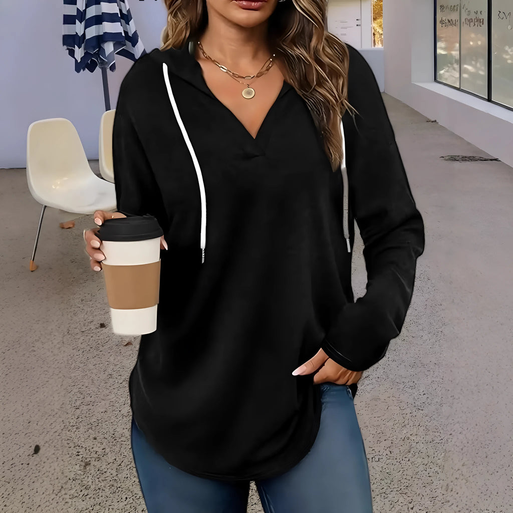 Women's red V-neck hooded sweatshirt with long sleeves and loose fit design