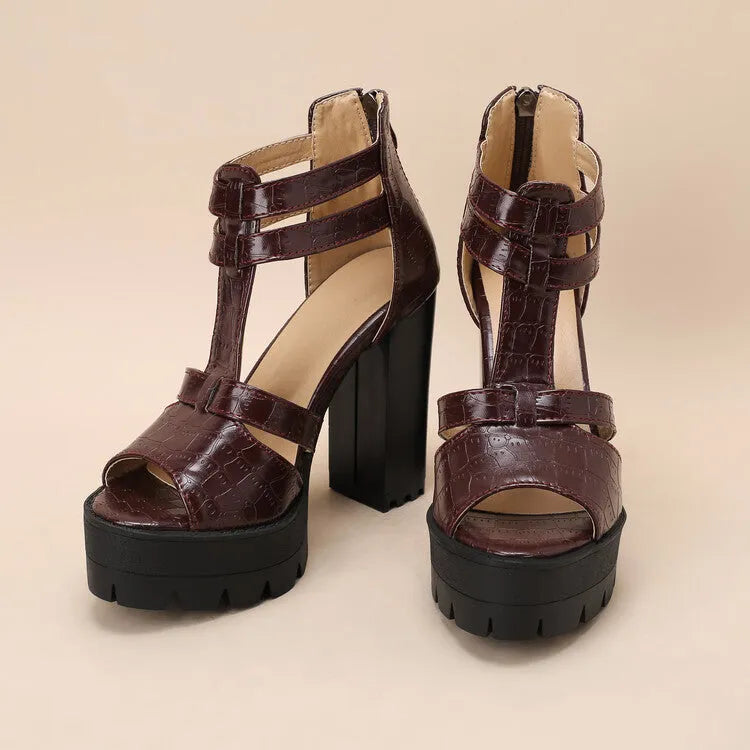 Women's black platform high heel sandals with a round toe and a back zipper fastening.