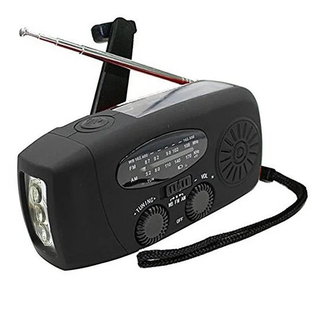 Solar hand crank radio flashlight in black, with multiband radio and USB charging port