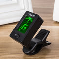 JOYO JT-01 clip-on electronic tuner for acoustic guitar, ukulele, bass, and violin, shown in three style options