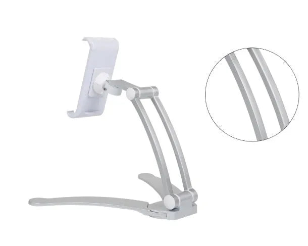 Silver aluminum desktop tablet stand holding a tablet, showing its adjustable clips and 360-degree rotation.
