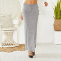 Black slim-fit mid-length acrylic skirt with side split and strap detailing on a mannequin