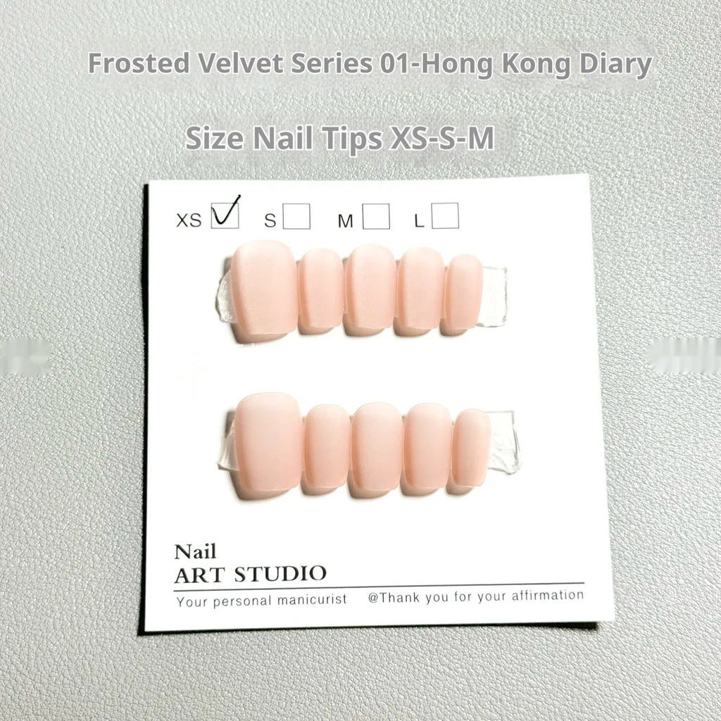 Set of frosted velvet texture cat's eye false nails in aurora style, showing short ladder shapes in sizes XS, S, and M.