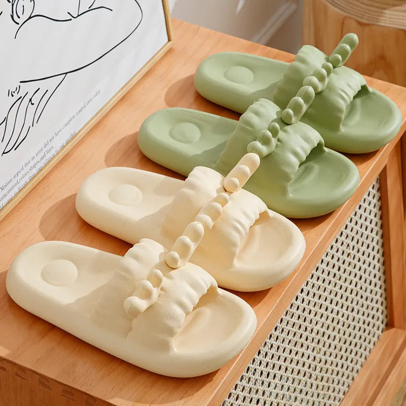 White EVA flip flop slippers with a cute deer horn design and a non-slip sole.