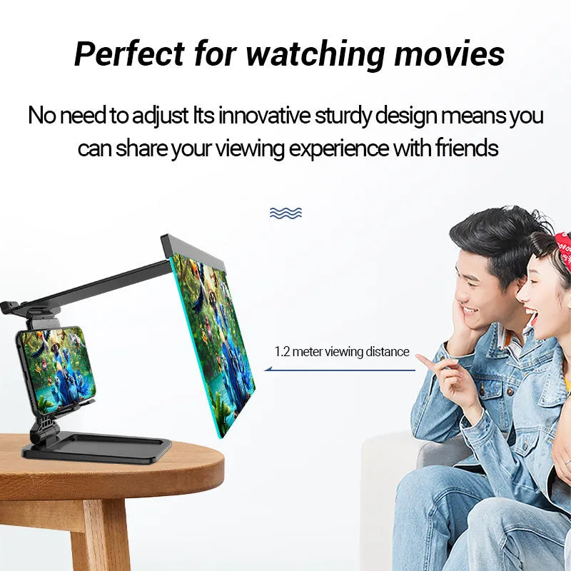Black folding mobile phone screen magnifier with detachable holder next to an iPhone.
