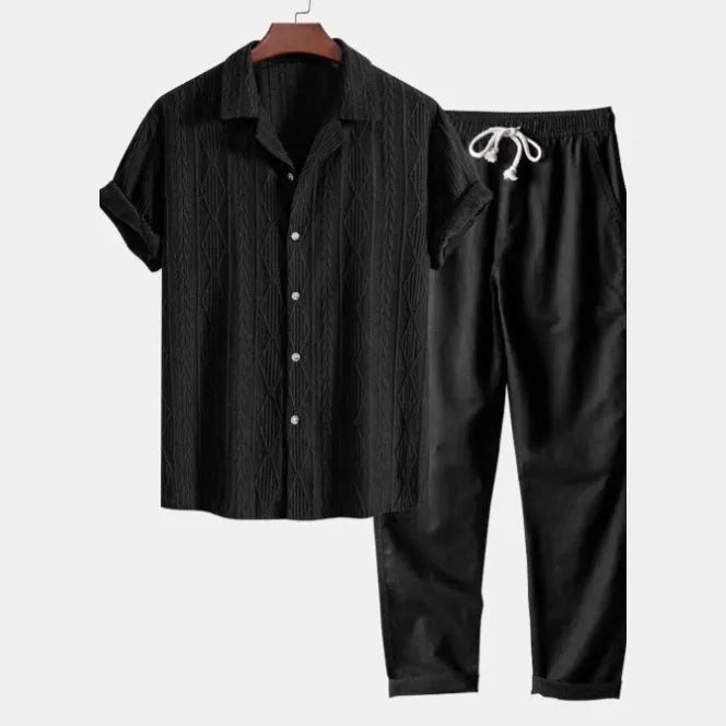 Slim-fit men's camouflage print shirt and trousers casual suit set on a hanger.