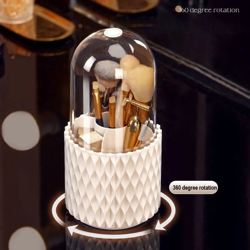 White acrylic rotating makeup brush holder with transparent dust cover showing split storage compartments