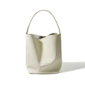 Genuine leather bucket bag for women, beige, with patchwork detailing and open outer pocket