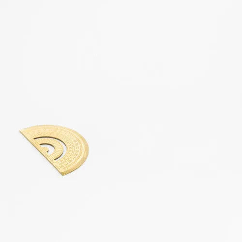 Rose gold and yellow stainless steel ruler set with protractor, triangle, and straightedge in transparent pocket