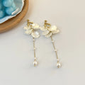 Long 8.8cm acrylic shell pearl tassel earrings for women with a choice of ear clip types.