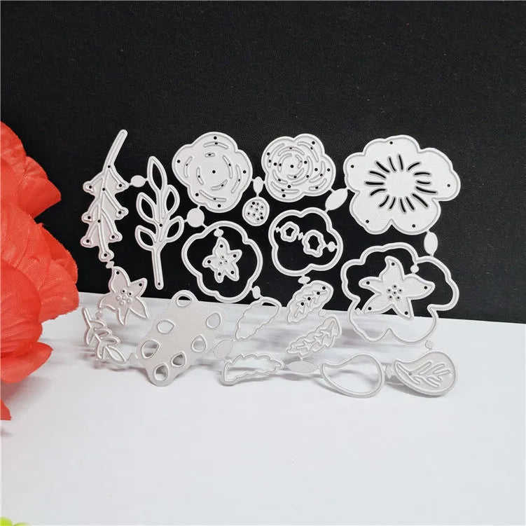 Silver carbon steel flower cutting die for paper crafts measuring 14.3x9.9cm