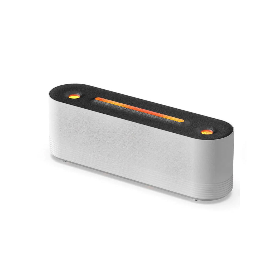 Black or white ultrasonic humidifier and aroma diffuser with LED lights creating flame mist effect.