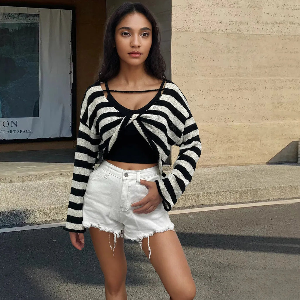 Striped long-sleeved cotton sweater shown wearable front and back, in black, pink, khaki, blue, or navy blue.